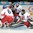 UFA, RUSSIA – DECEMBER 31: Czech Republic's Patrik Bartosak #1 makes a stick save against team Switzerland during preliminary round action at the 2013 IIHF Ice Hockey U20 World Championship. (Photo by Richard Wolowicz/HHOF-IIHF Images)